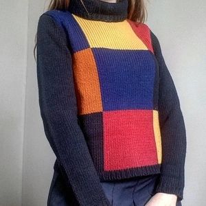 multi colored turtle neck sweater